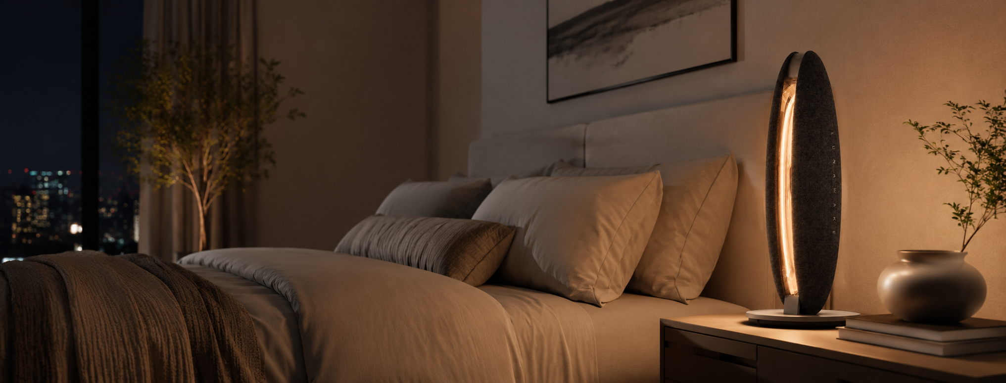 LunaWake glowing on a bedside table in a quiet bedroom at night